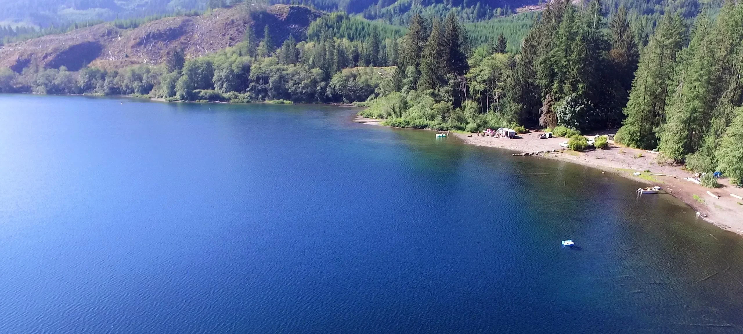 Aerial view of Cowichan Lake and waterfront properties in Lake Cowichan