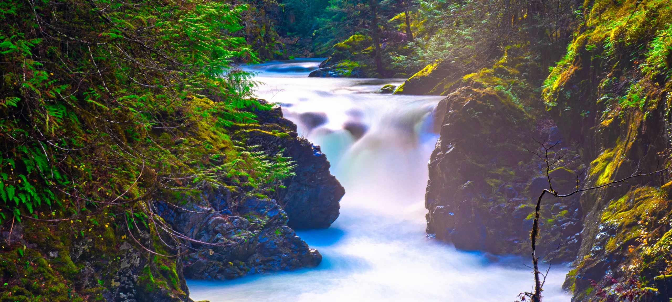 Sunny day at waterfall at Little Qualicum Falls Provincial Park