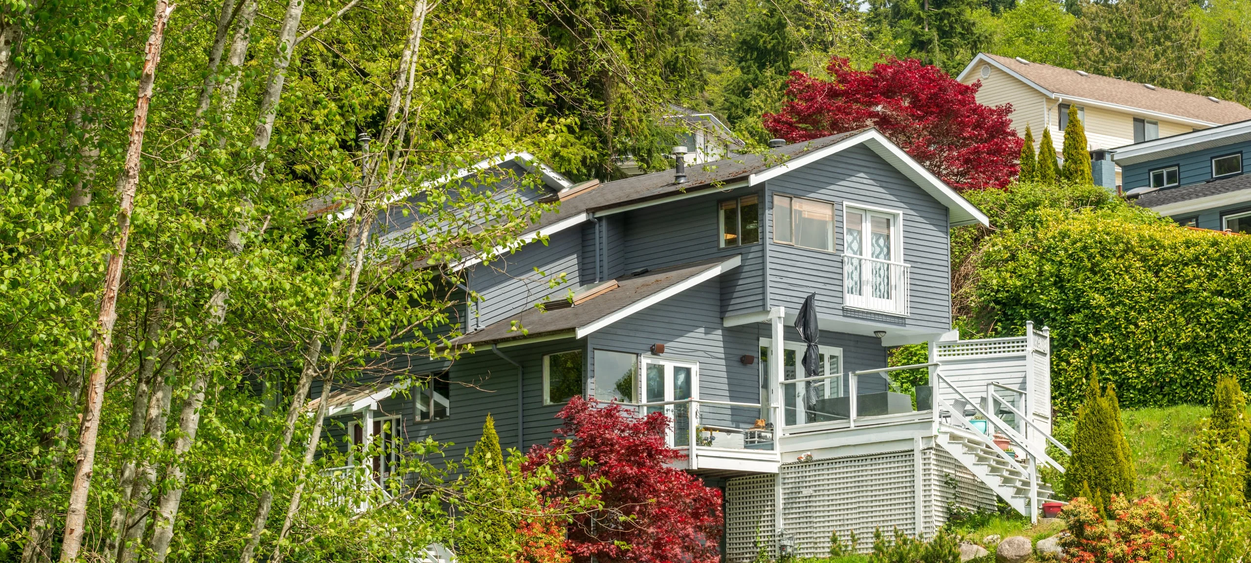 West Coast style home within the trees, typical of Qualicum area
