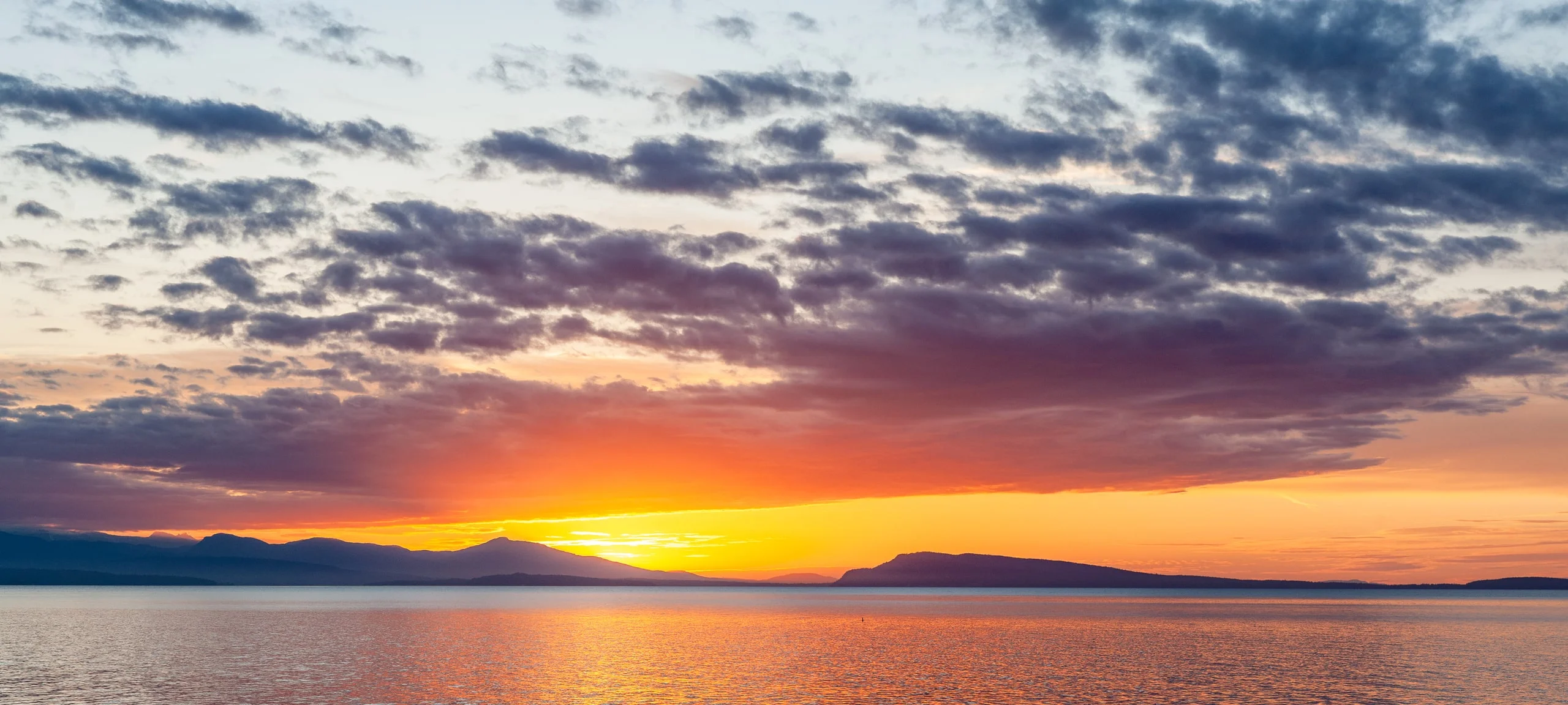 Sunrise over Qualicum Beach waterfront, on Vancouver Island