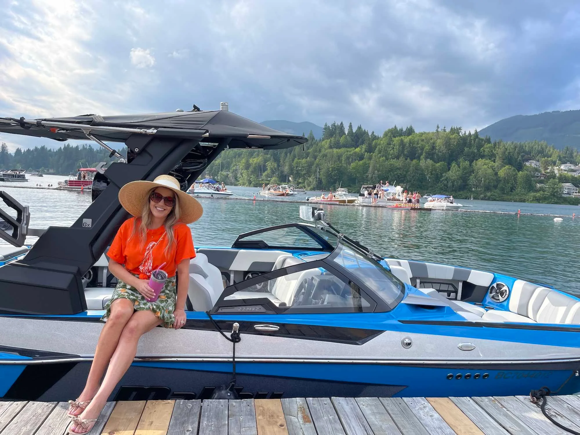 carly carey sitting on a malibu boat