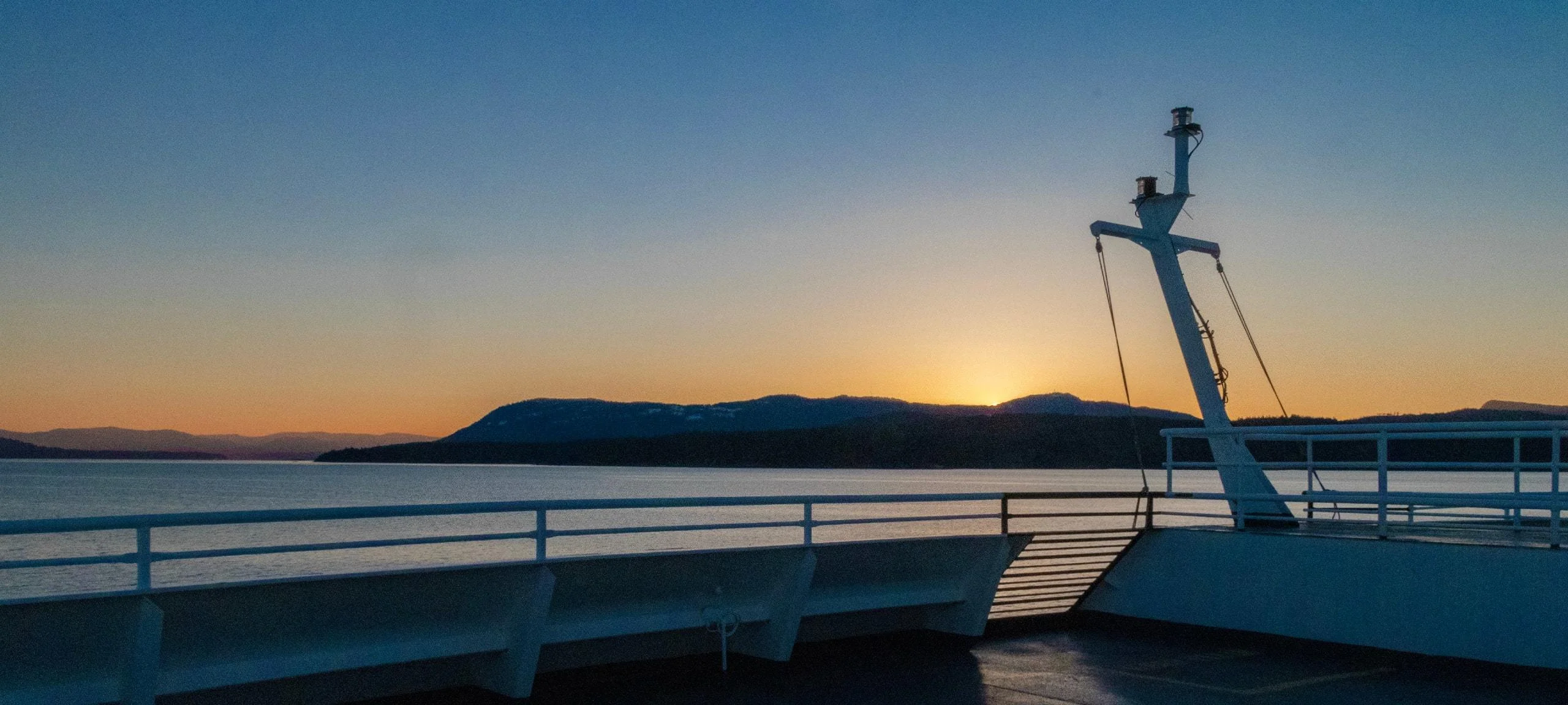 Sunset over South Pender Island, BC from boat