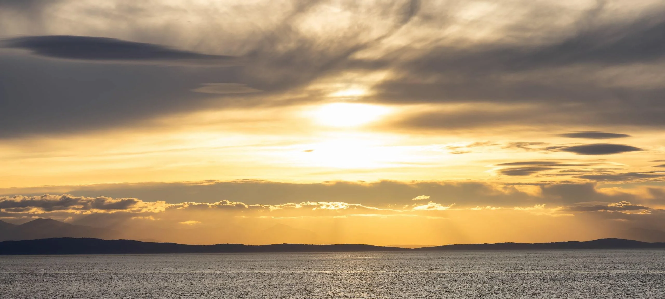 Sunset over water by Thetis Island, BC