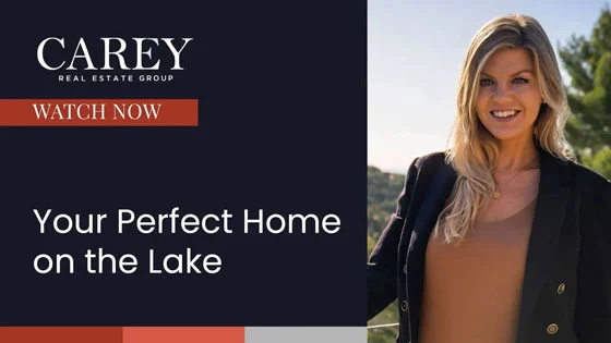 Carly Carey by balcony in front of lake view