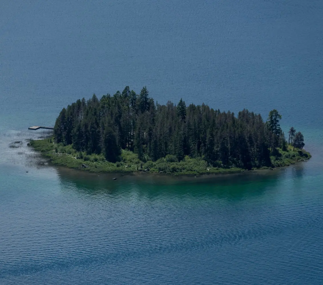 Aerial view of small, private island in Lake Cowichan