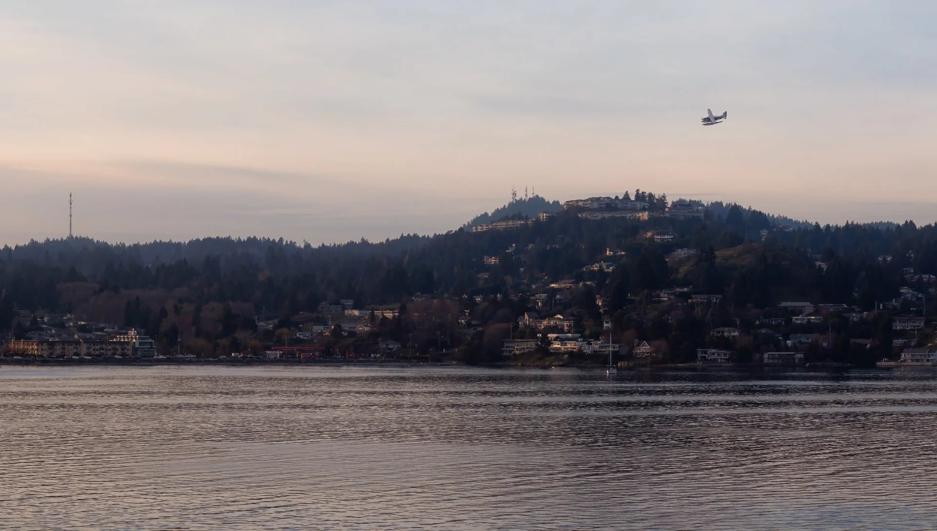 Nanaimo real estate on hilly waterfront at sunset