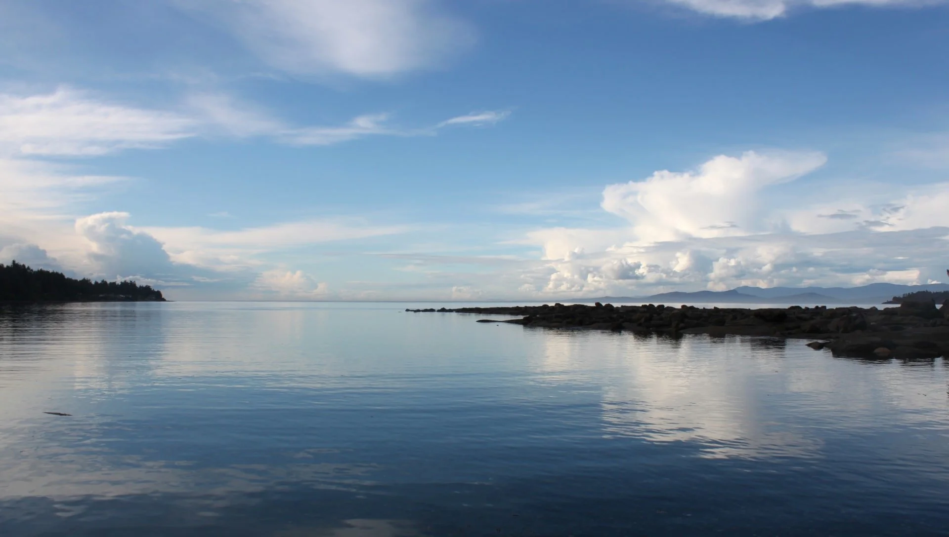 Bright clouds over sunny Nanoose Bay, BC