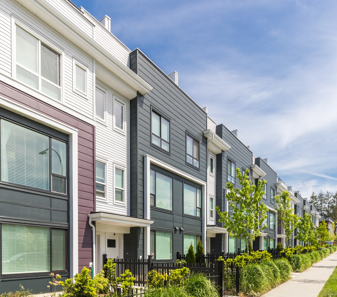 Row of new construction, modern-stye townhomes