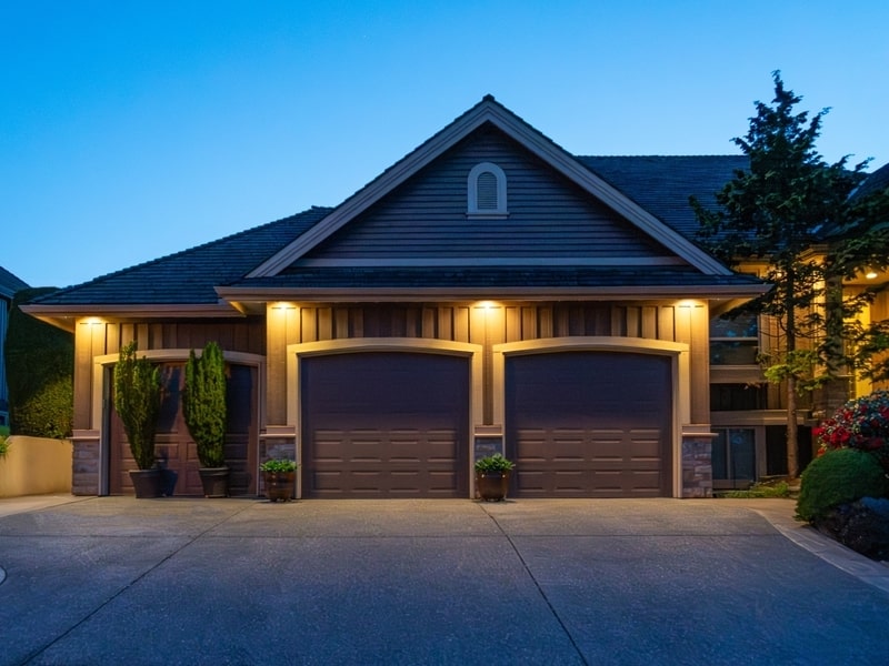 Aerial view of private dock and boat, typical of Shawnigan Lake homes