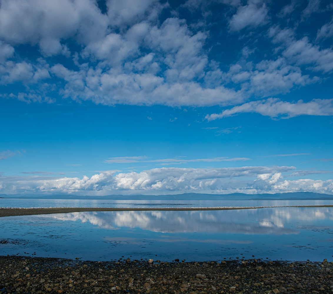 View of Strait of Georgia from Qualicum beach. Photo by Bill Pennell on Unsplash.